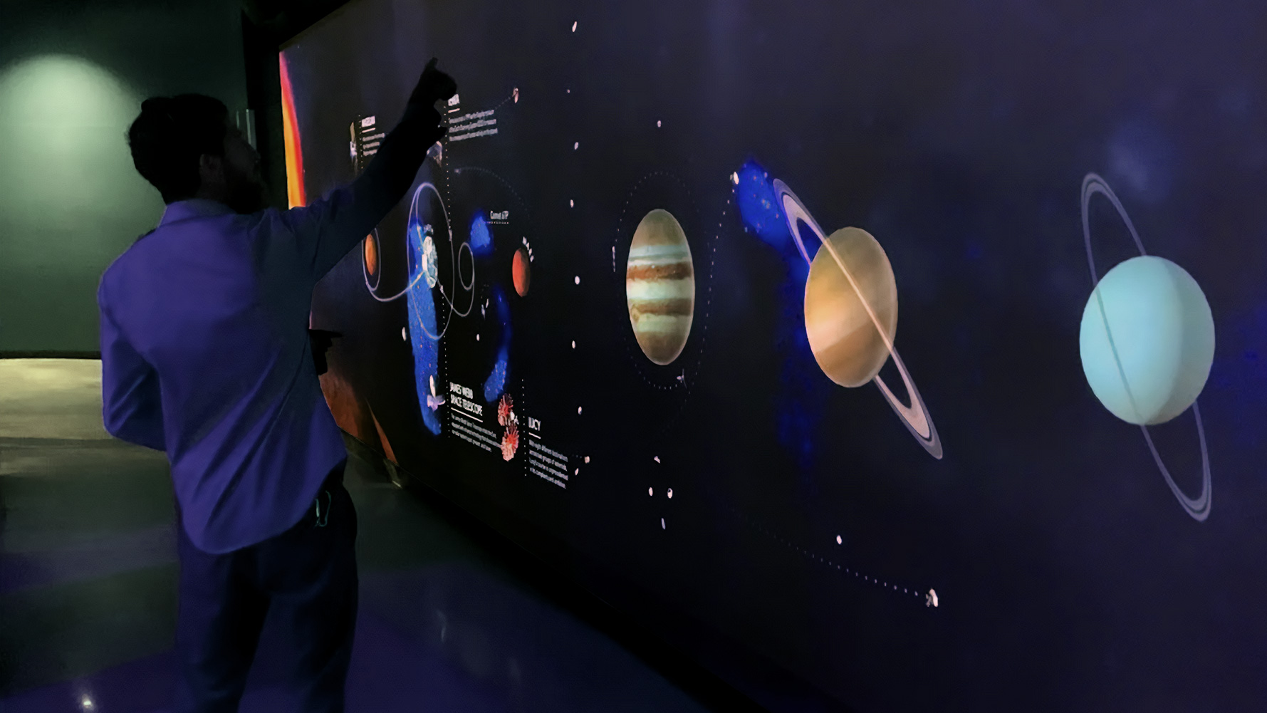 The projection wall tracks the trajectories of more than 40 unmanned spacecraft on their journeys through the solar system and beyond.