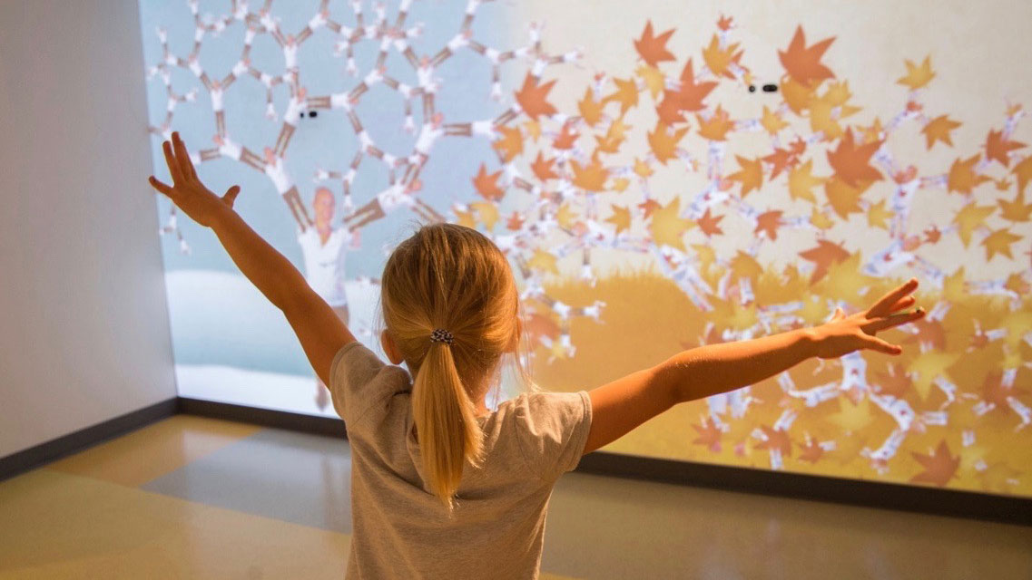 Human Tree uses full-body interaction to turn visitors into fractal trees, allowing them to explore complex geometry through creative play.
