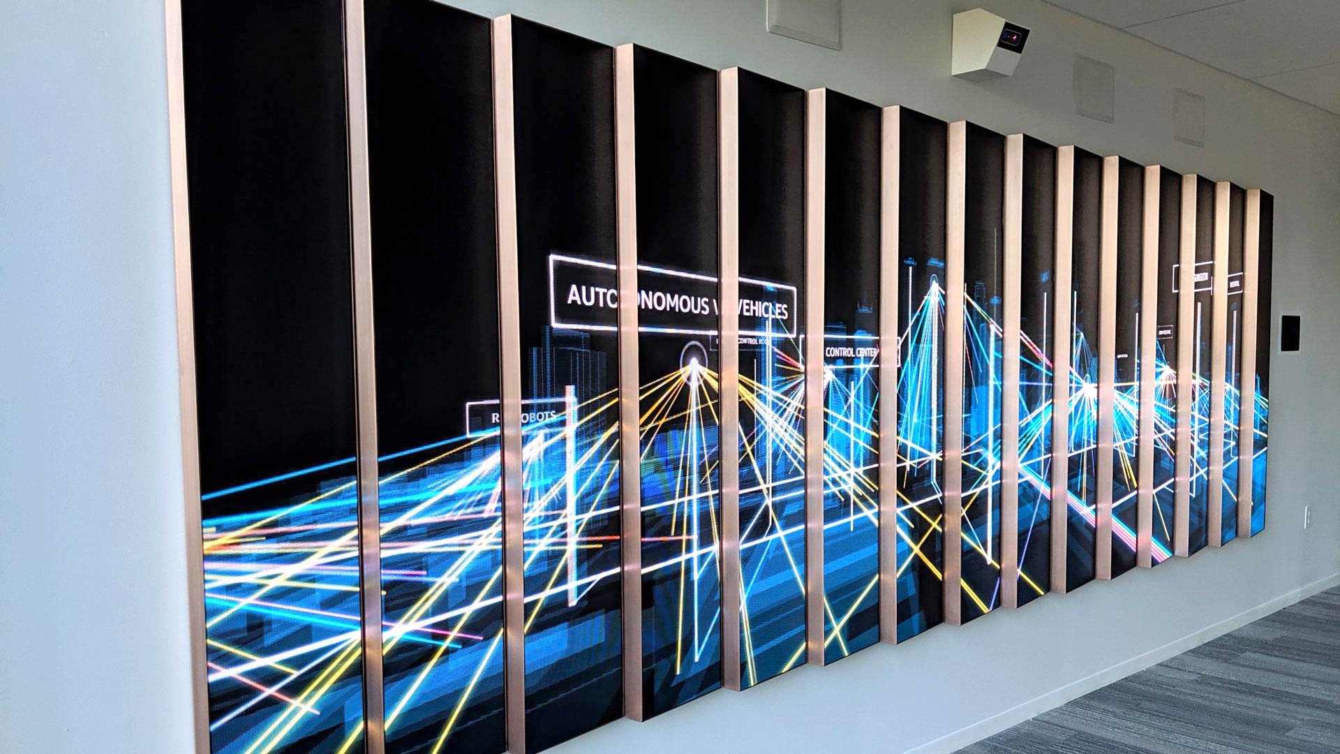 The display is built from staggered LED panels, creating a unique sense of three-dimensionality.